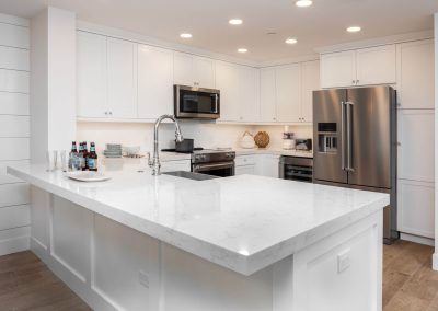 white marble counter top orange moon interiors