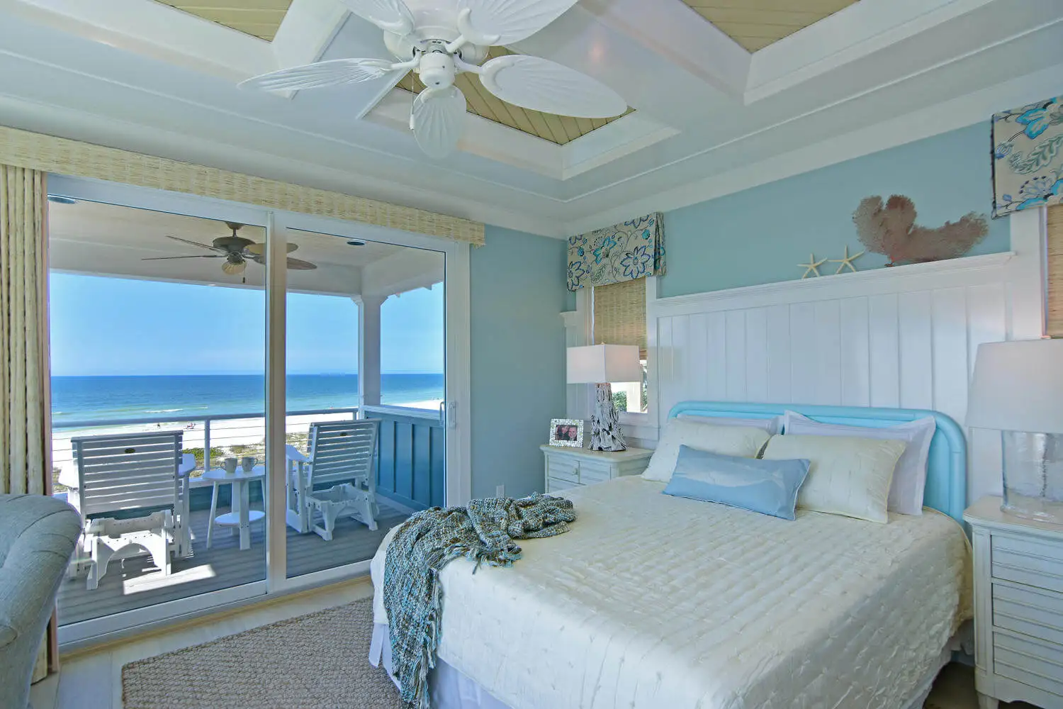 a fresh look bedroom overlooking the sea interior decorator near me fl